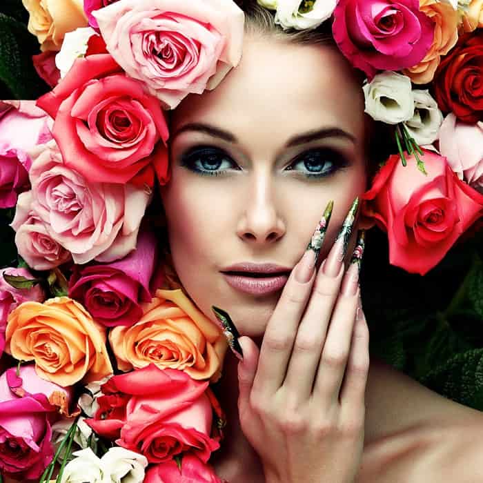 Beutiful woman with colorful flowers.
